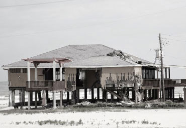 wind damage - spray foam can help prevent uplift to Bakersfield roofs